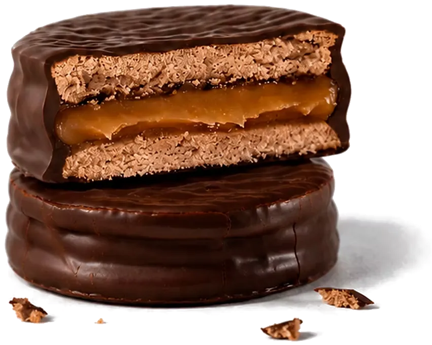 Corte del alfajor Mülinda mostrando la galletita de cacao y el relleno de dulce de leche